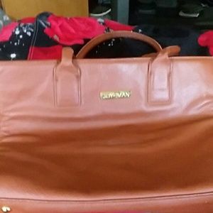 Joy and Iman handbag